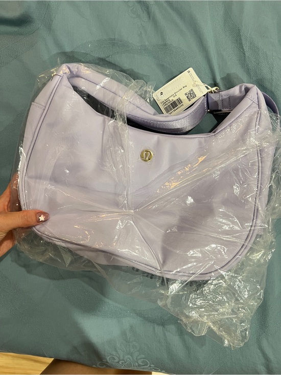 lululemon lavender bag Everywhere Crossbody Belt 1L inspired silhouette and an adjustable shoulder strap make this shoulder bag easy to wear multiple ways Lululemon On My Level Tote
